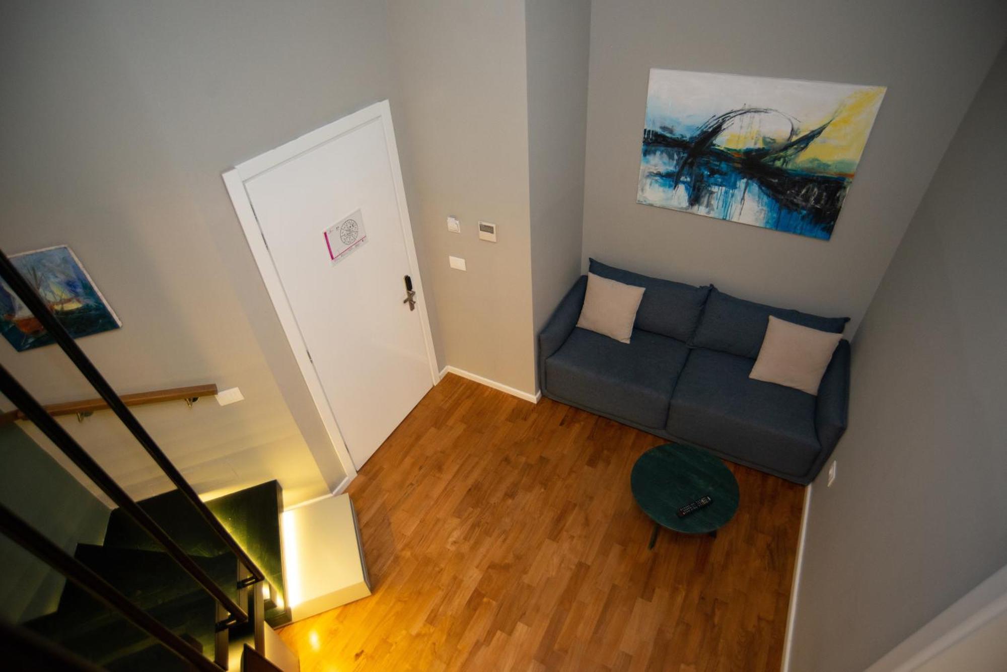 Bougainville Bay Hotel Sarande Exterior photo A living room in a typical apartment