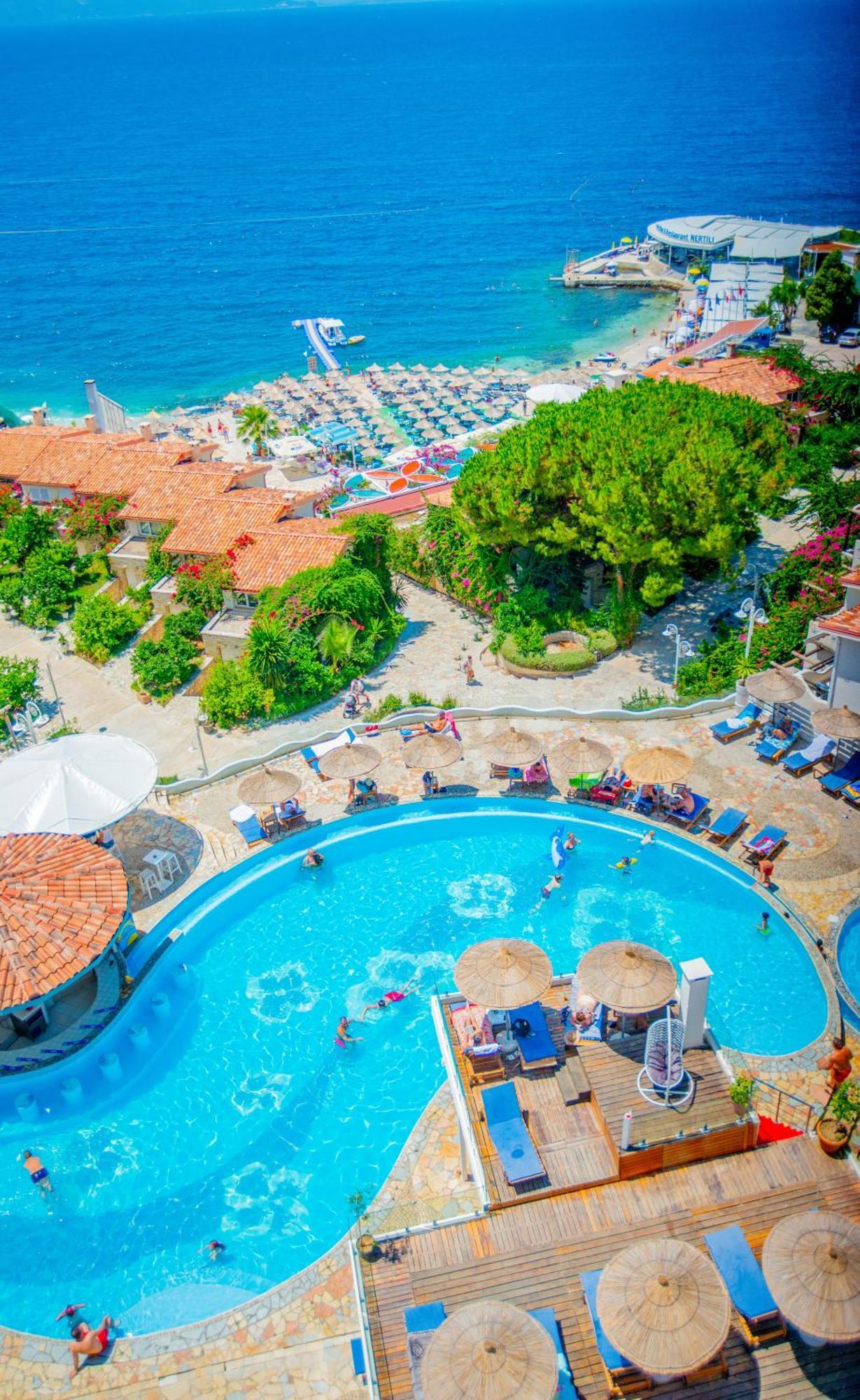 Bougainville Bay Hotel Sarande Exterior photo Aerial view of the pool